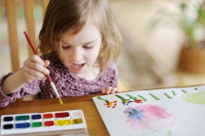 child painting at home